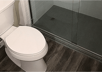 Toilet with new bathroom flooring