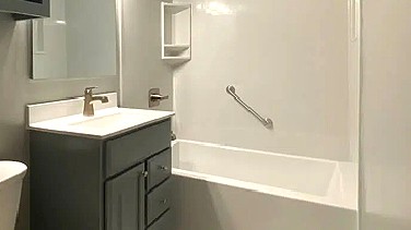 Bath tub and cabinet with sink